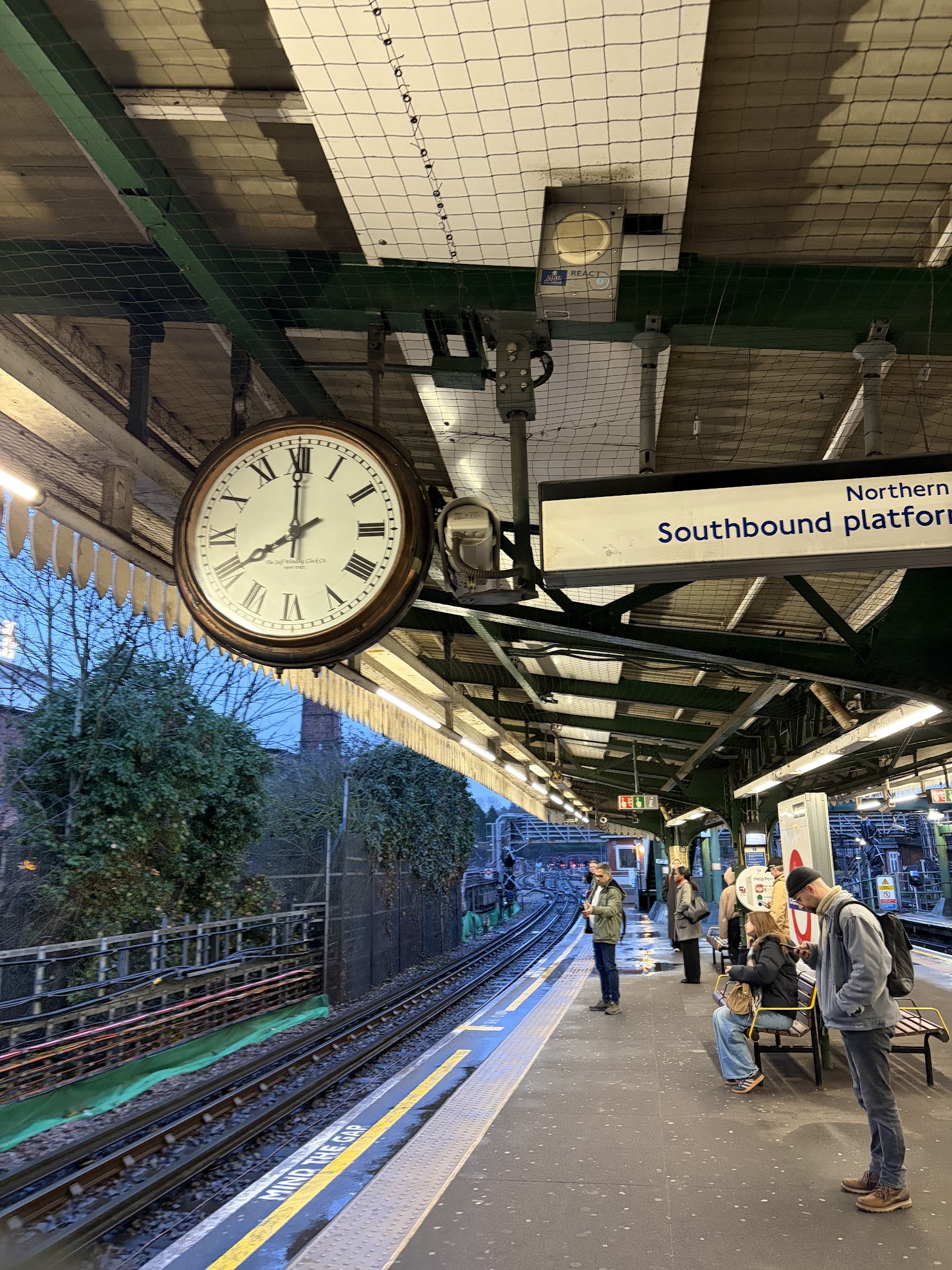 London tube platform, Northbound, Southbound platform sign with clock